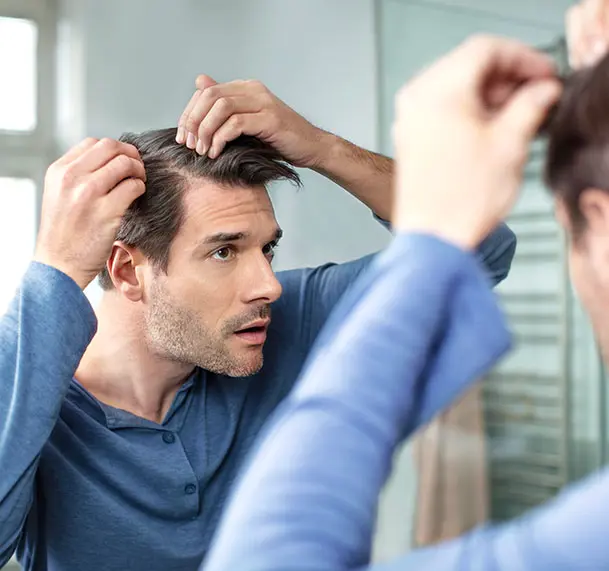 Hvorfor får man skæl og hvad er det egentlig?